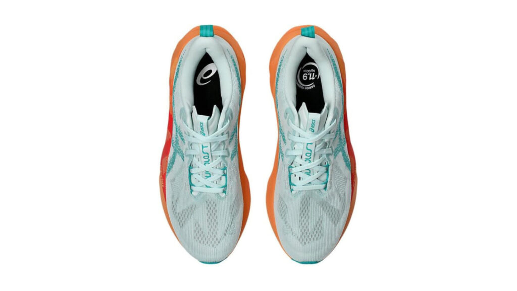 A detailed side profile view of the ASICS Novablast 5 running shoe, showcasing its superior comfort features. The shoe is illuminated by soft, directional lighting, highlighting the plush, responsive midsole cushioning and supportive, anatomically-shaped upper. The seamless, breathable mesh material and reinforced overlays are clearly visible, conveying a sense of high-performance and lightweight comfort. The shoe is positioned against a clean, minimalist background, allowing the design details to take center stage. The overall mood is one of premium quality, modern aesthetics, and an emphasis on the shoe's innovative comfort technologies.